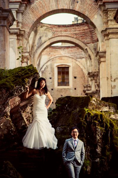 bride and groom portrait in beautiful ruins Convento de las Capuchinas and reception at San Jose El Viejo in Antigua, Guatemala.