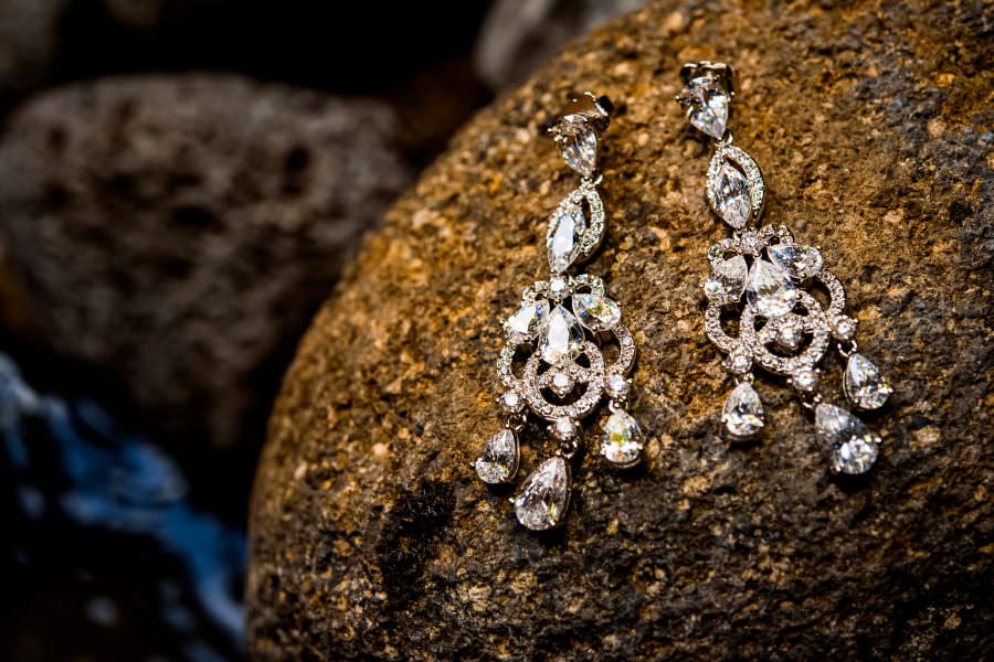 bride earrings at destination wedding at Convento de las Capuchinas and reception at San Jose El Viejo in Antigua, Guatemala.