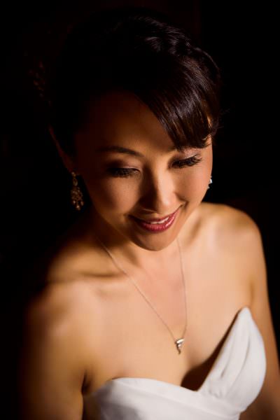 window light bridal portrait at wedding at Convento de las Capuchinas and reception at San Jose El Viejo in Antigua, Guatemala.