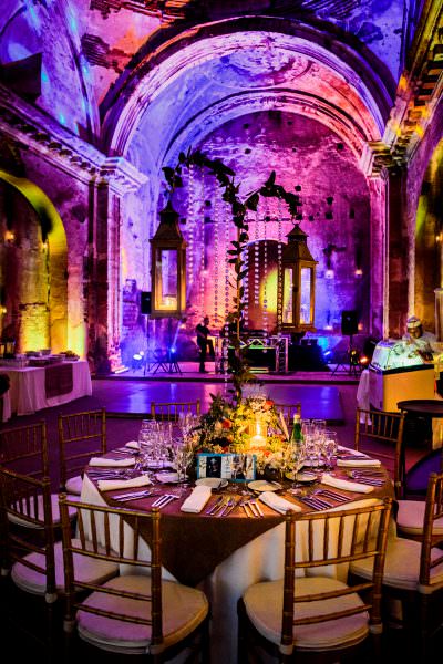 dramatic lighting at wedding reception at San Jose El Viejo in Antigua, Guatemala.