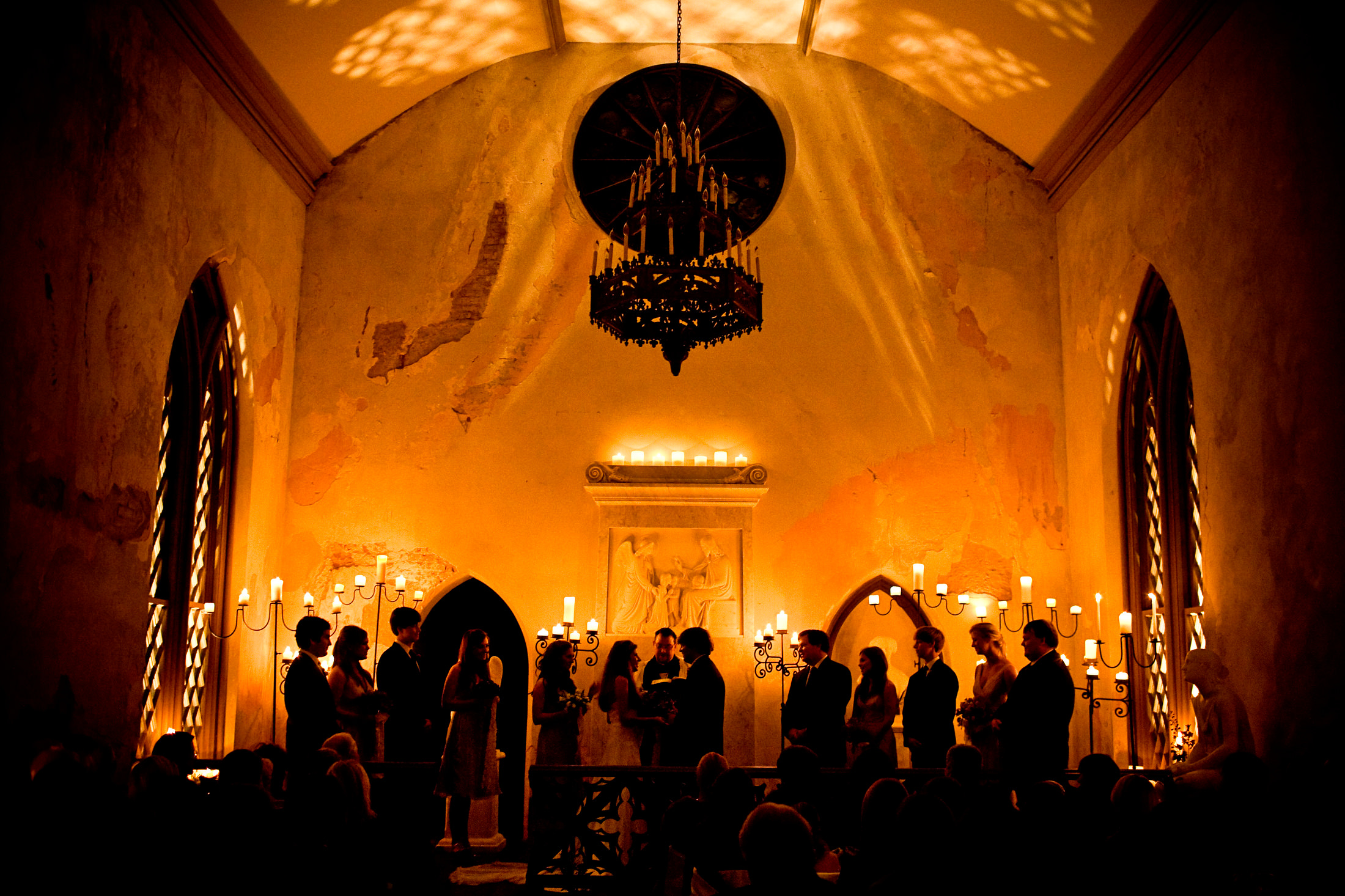 A candlelight wedding ceremony in a small church in Natchez, MS.